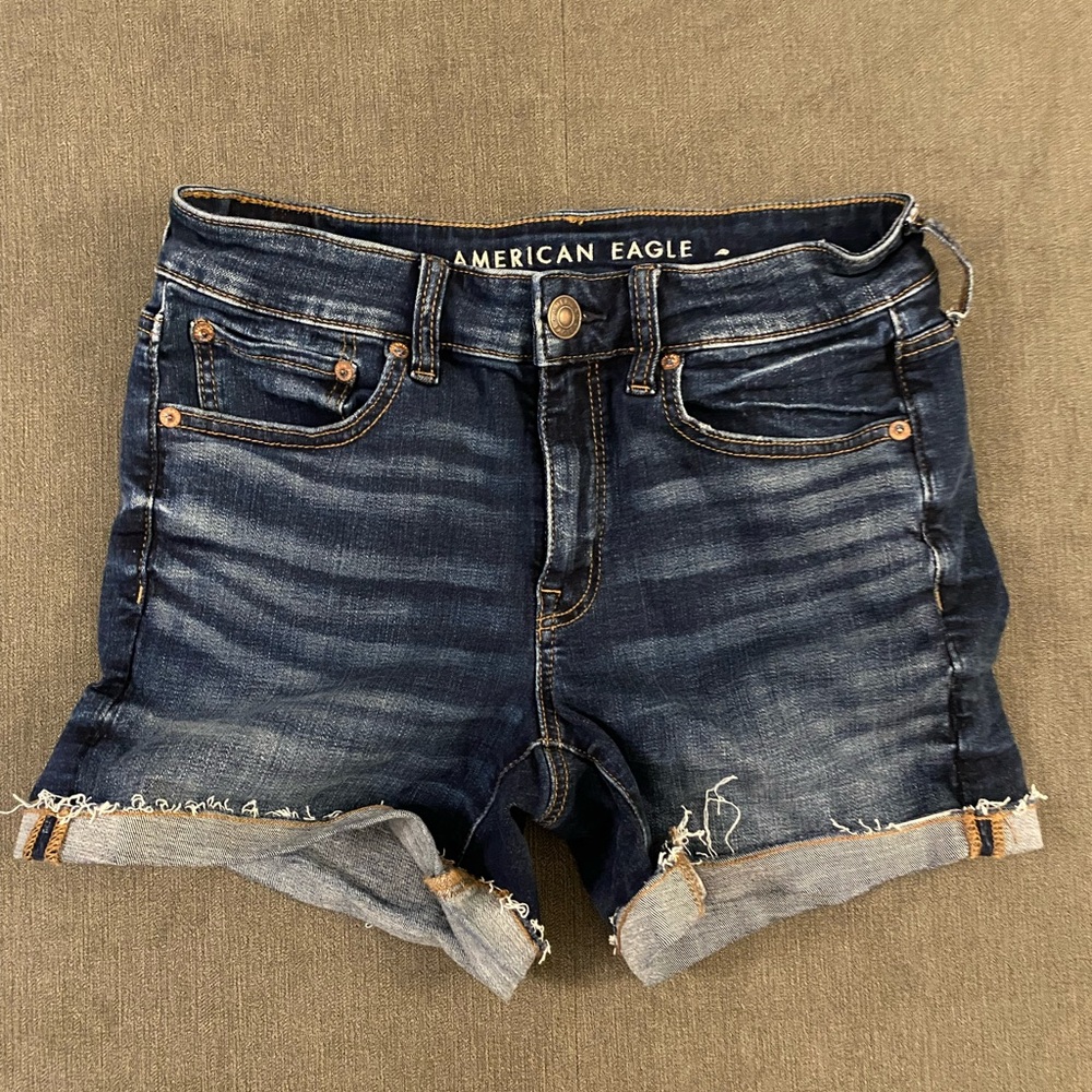American Eagle Size 8 Midi Medium to Dark Wash Jean Shorts.